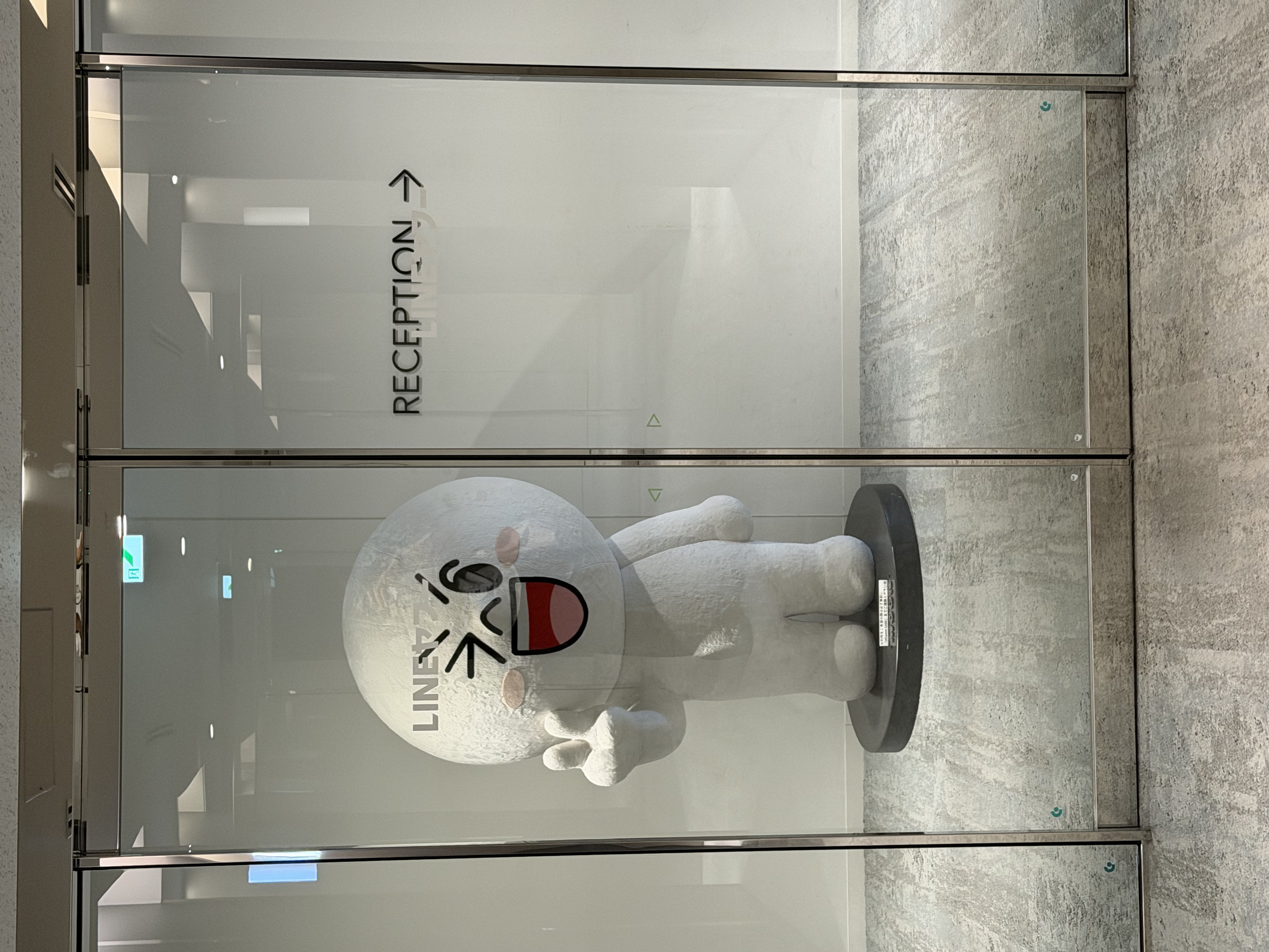 LINE FRIENDS character Moon beside the reception entrance at LINE's Fukuoka office
